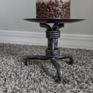 Industrial cast iron candle holder